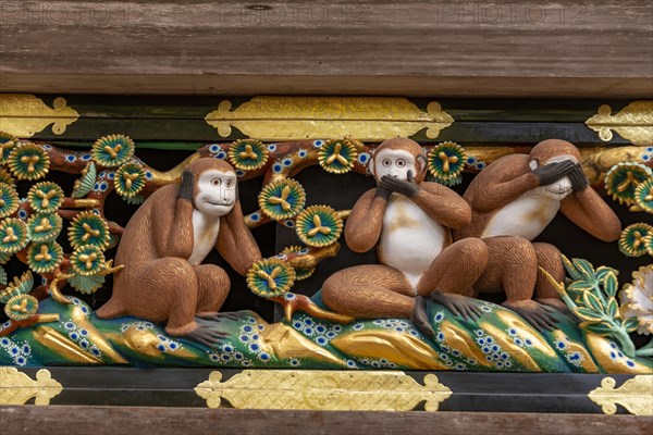 Carving of the three monkeys on the facade of the holy stable