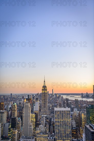 View of Midtown and Downtown Manhattan and Empire State Building from Top of the Rock Observation Center at sunset