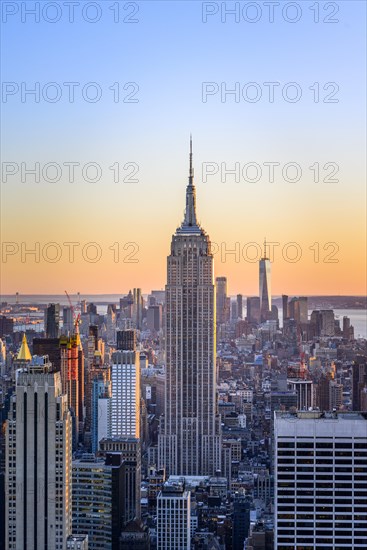 View of Midtown and Downtown Manhattan and Empire State Building from Top of the Rock Observation Center at sunset