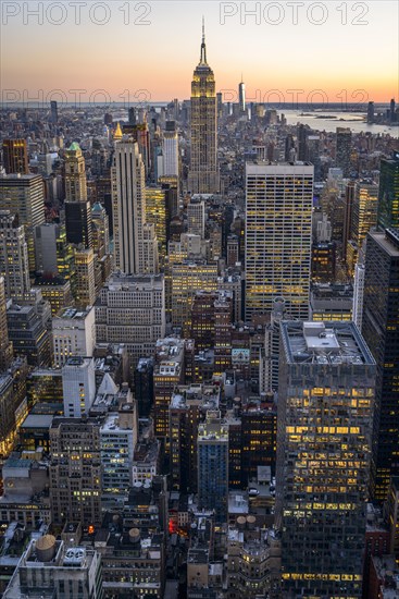 View of Midtown and Downtown Manhattan and Empire State Building from Top of the Rock Observation Center at sunset