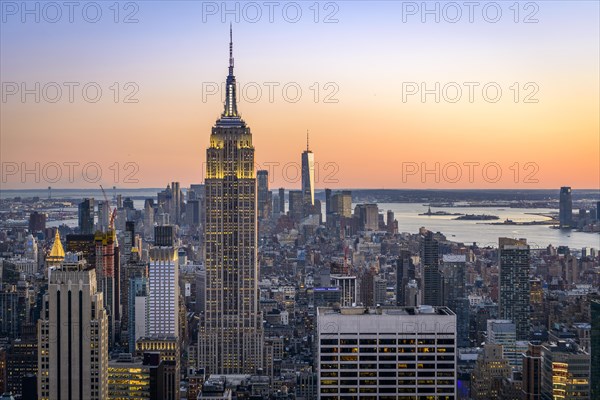 View of Midtown and Downtown Manhattan and Empire State Building from Top of the Rock Observation Center at sunset