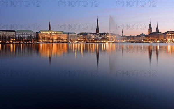 Inner Alster Lake with Alster fountain at dusk