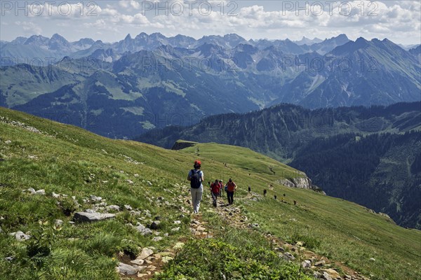 Mountain hikers descending from the summit of Hoher Ifen