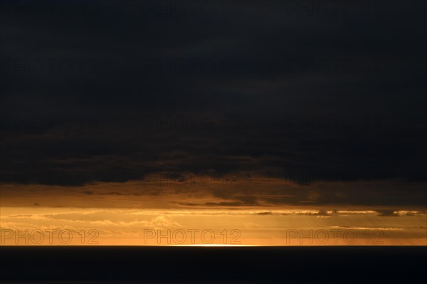 Dramatic cloudy sky at sunset