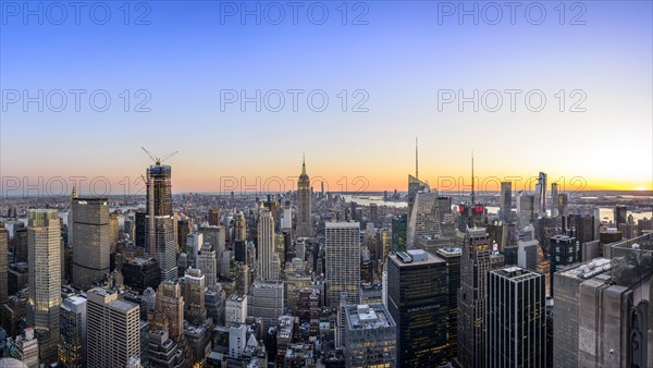 View of Midtown and Downtown Manhattan and Empire State Building from Top of the Rock Observation Center at sunset