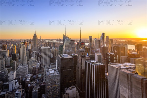 View of Midtown and Downtown Manhattan and Empire State Building from Top of the Rock Observation Center at sunset