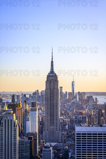 View of Midtown and Downtown Manhattan and Empire State Building from Top of the Rock Observation Center at sunset