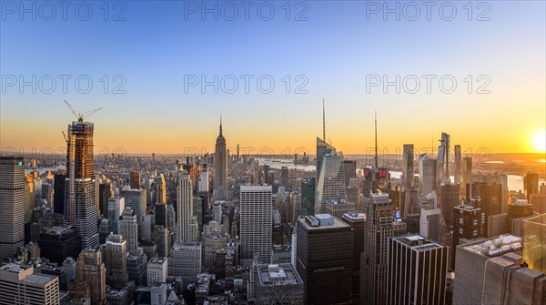 View of Midtown and Downtown Manhattan and Empire State Building from Top of the Rock Observation Center at sunset