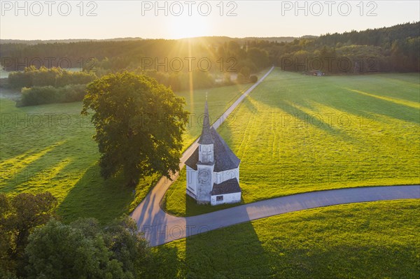 Chapel of St. Leonhard in Harmating at sunrise