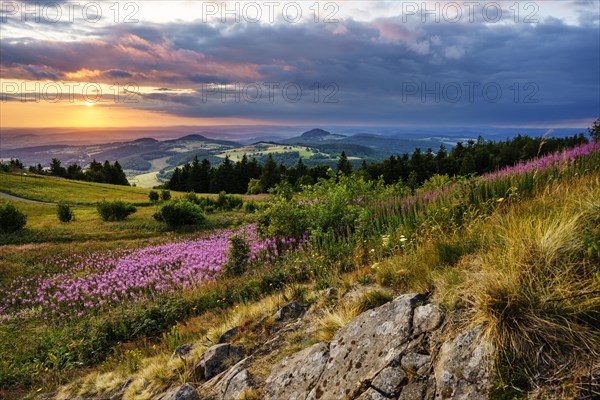 View from the Wasserkuppe to the hilly landscape at sunset