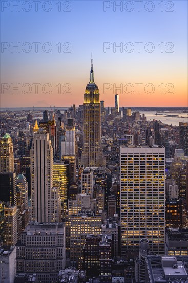 View of Midtown and Downtown Manhattan and Empire State Building from Top of the Rock Observation Center at sunset