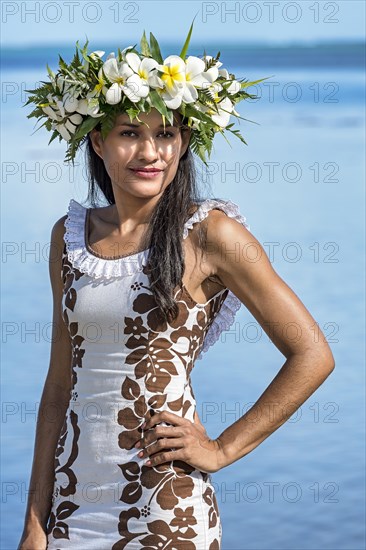 Young woman with flower wreath from Frangipani
