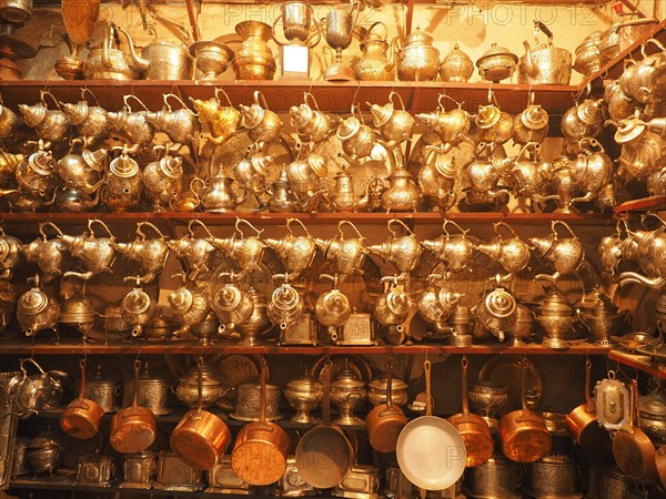 Shop with traditional silver and brass crockery