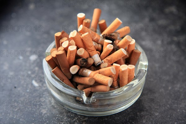 Ashtray full of cigarettes