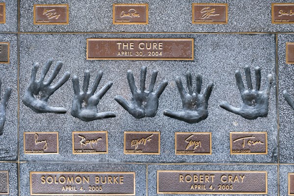 Hands of the band The Cure with Perry BamonteRoger O'Donnell