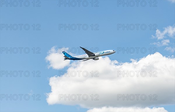 Passenger aircraft Airbus A330neo in flight