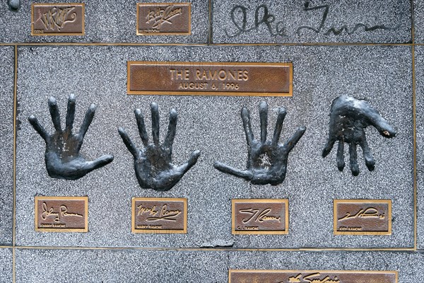 Hands of the band The Ramones with JohnnyMarky