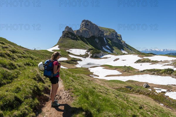 Young woman on a hiking trail