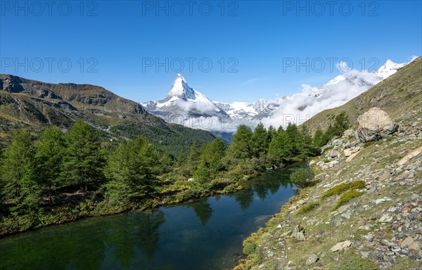 View over Lake Grindij with snow-covered Matterhorn