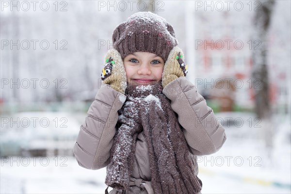 Girl with wool cap in winter