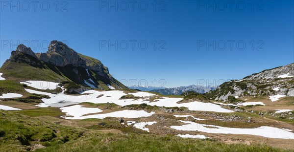 Mountain landscape with snow remains