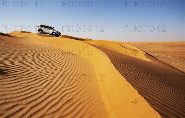 Off-road vehicle in the sand dunes