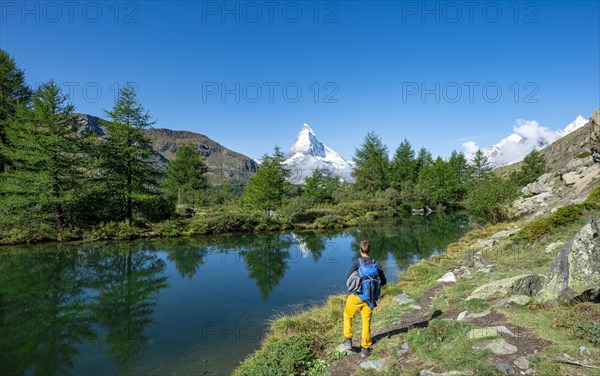 Hiker on Lake Grindij