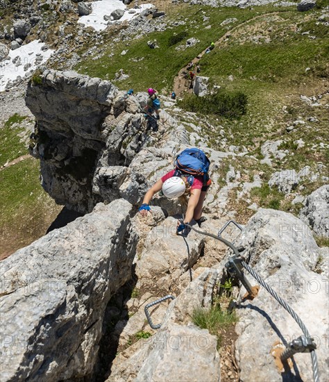 Young woman climbing