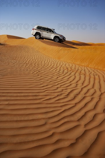 Off-road vehicle in the sand dunes