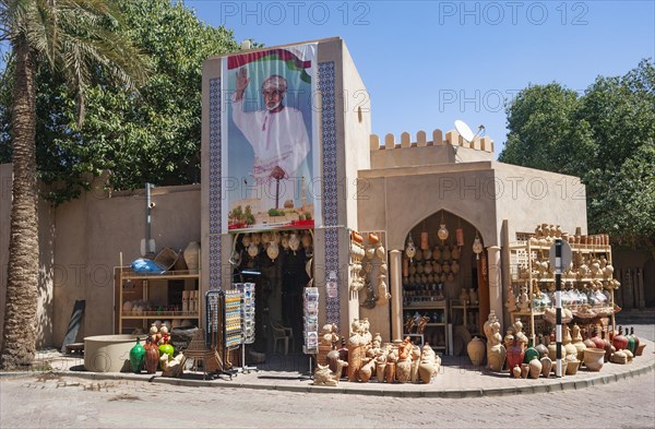 Clay jugs in front of souvenir shop