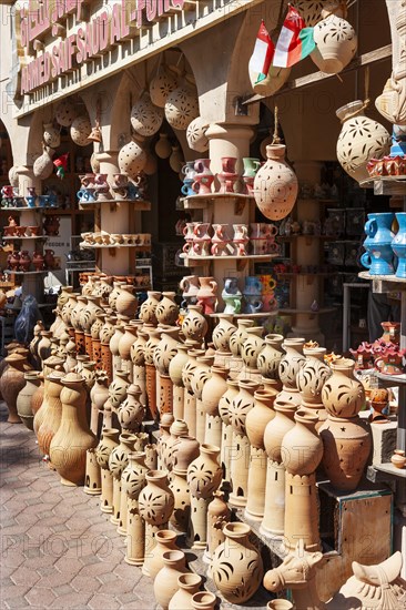 Clay jugs in front of souvenir shop