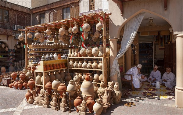 Clay jugs in front of souvenir shop