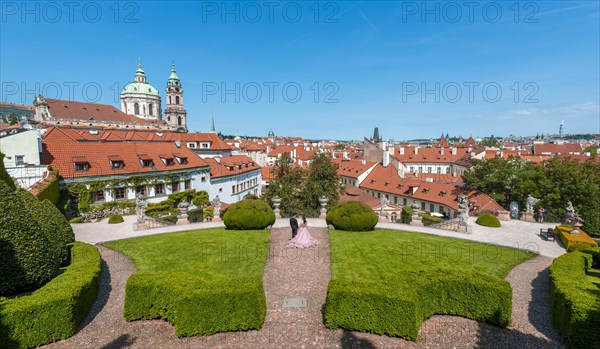 Wedding couple in Vrtba garden in baroque style