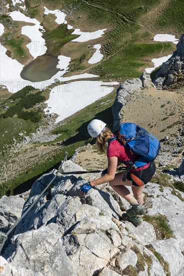 Young woman climbing