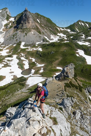 Young woman climbing