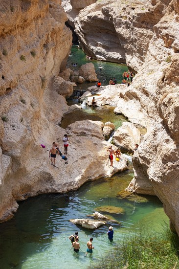 Freshwater pool between rugged cliffs