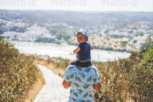 Father walking with his son