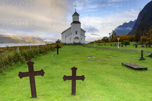 Crosses in cemetery and church