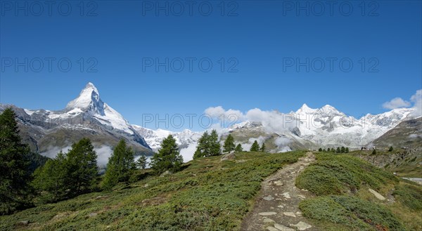 View of the snow-covered Matterhorn and surrounding mountains