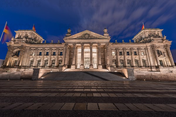 Reichstag with waving German flag