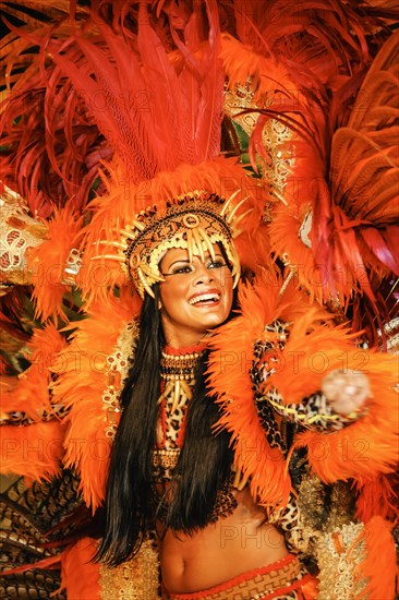 Dancer with red feather decoration