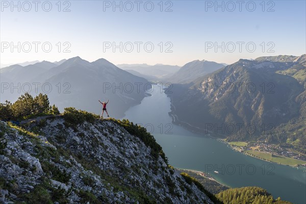 Young woman jumps into the air