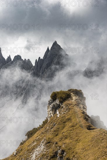 Bizarre mountain peaks with dramatic clouds