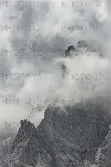 Bizarre mountain peaks with dramatic clouds