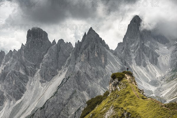 Woman standing on a ridge