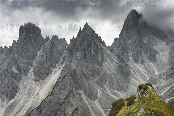 Woman standing on a ridge