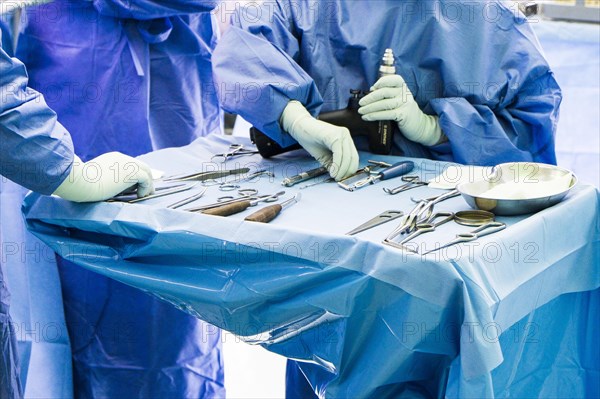 Cutlery table with surgical instruments during an operation in hospital