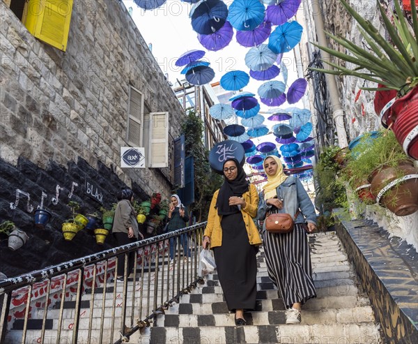 People on Umbrella Stairs