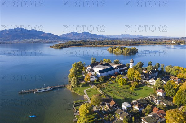 Steam jetty and Benedictine monastery Frauenwoerth on Fraueninsel