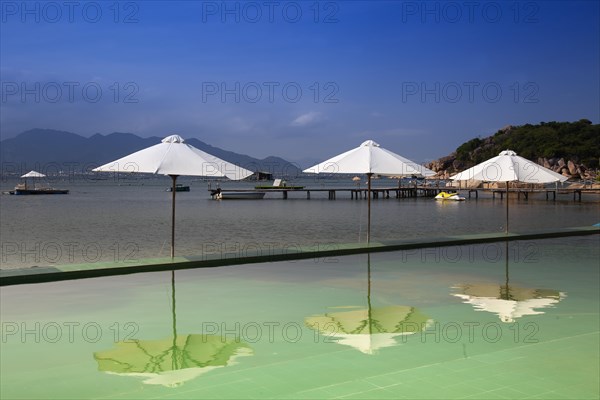 Swimming pool with parasols